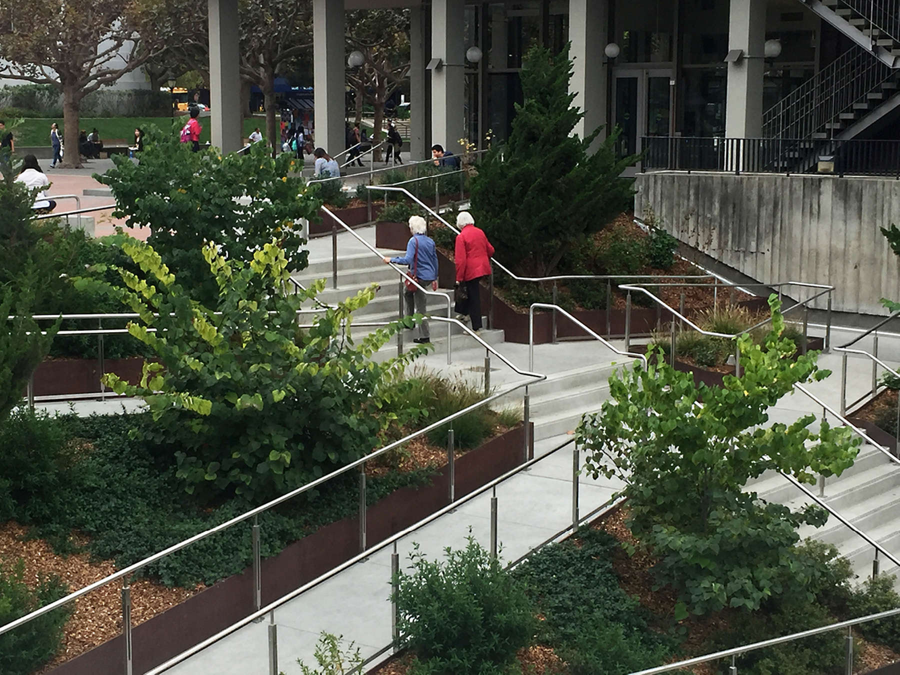 Students at UC Berkeley levied a self-imposed fee to redesign the new student union building and plaza at the Lower Sproul which includes a large rain garden and cistern to irrigate the landscape. 